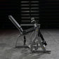Hammer Strength plate-loaded iso-lateral leg extension machine with gray frame, black padded seat, and digital display on gym
