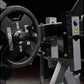 Hammer Strength plate-loaded iso-lateral leg extension machine with black rubber grips and metal frame on black background