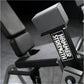 Hammer Strength plate-loaded iso-lateral leg extension machine with gray seat and black frame detail