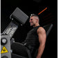 Man using Hammer Strength leg extension machine with black seat and control panel on black background
