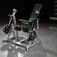 Hammer Strength plate-loaded iso-lateral leg extension machine with gray frame, black seat, and dual weight plate holders on 