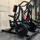 Black plate-loaded iso-lateral row machine with brown leather seat and handles in gym setting