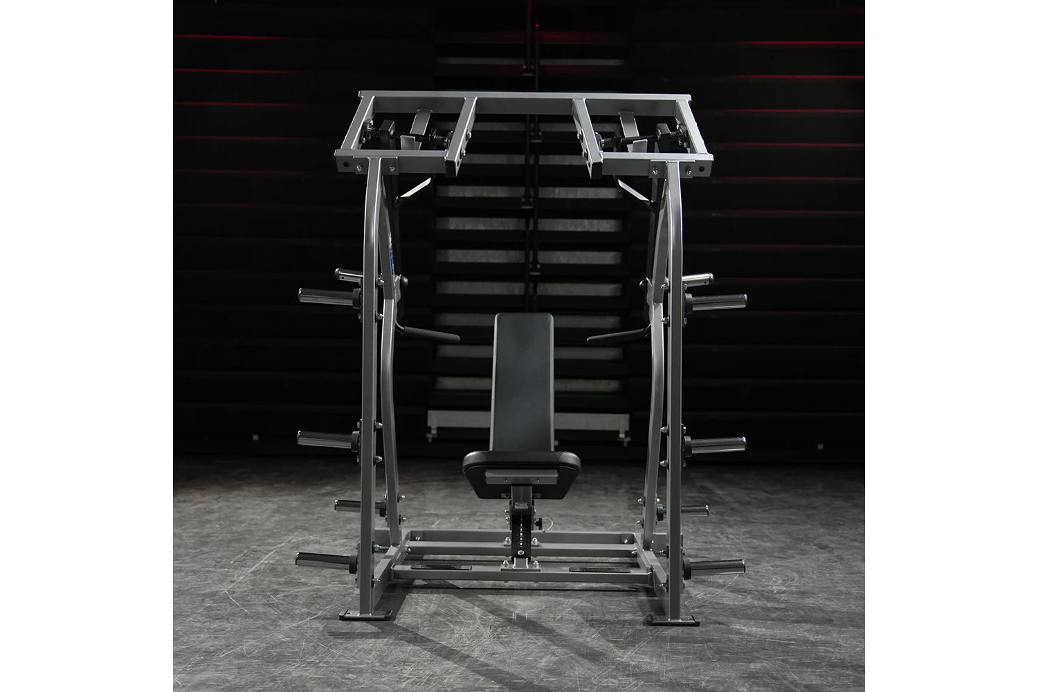 Hammer Strength plate-loaded iso-lateral shoulder press machine with silver frame, black seat, and dual weight plate holders 
