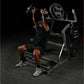 Man using black Hammer Strength plate-loaded incline press with dumbbells, demonstrating chest exercise form