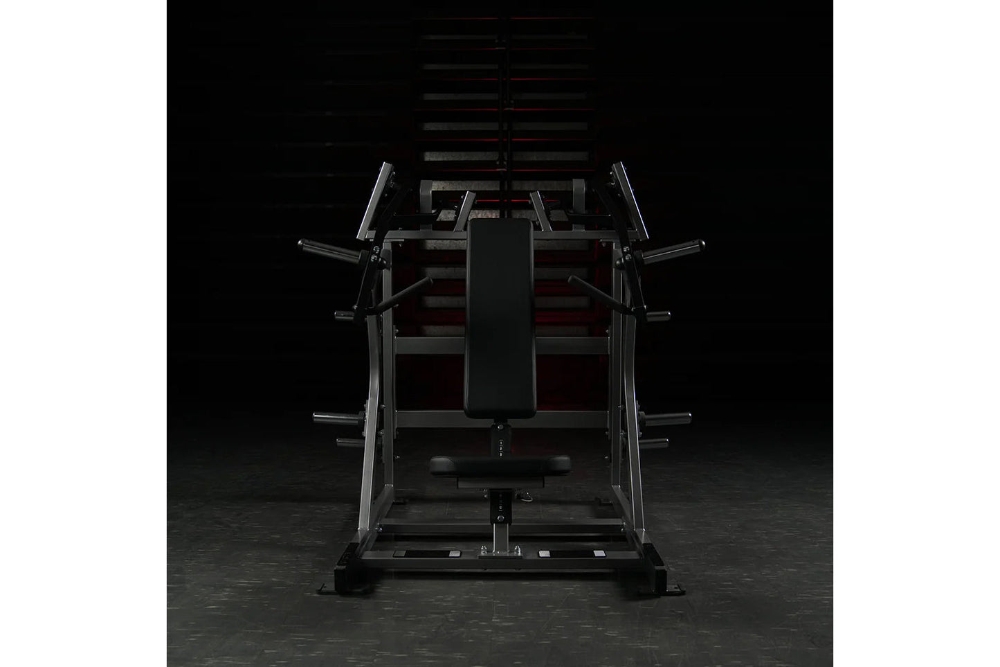 Black plate-loaded iso-lateral super incline press with dual arms and adjustable seat, front view on dark background
