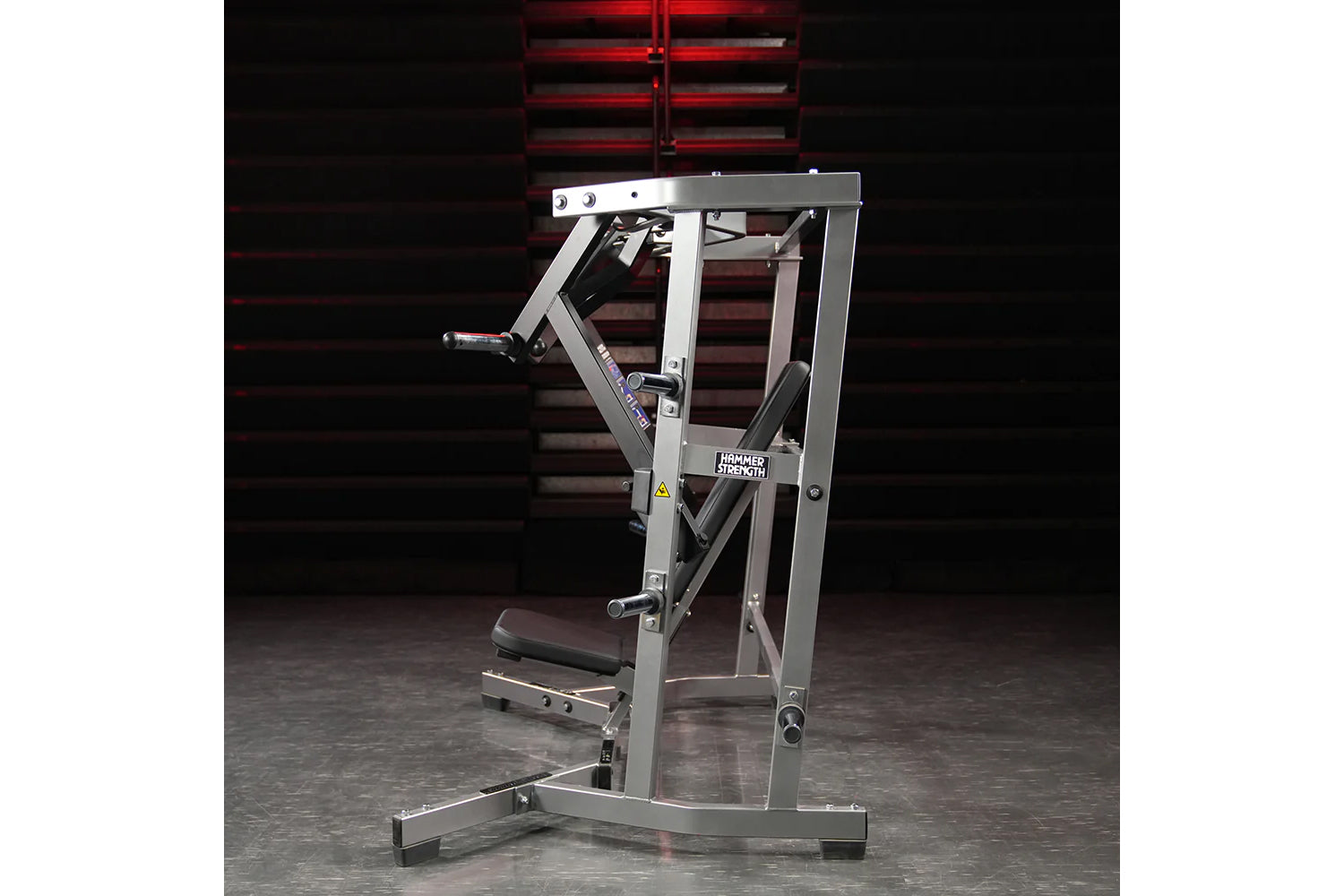 Hammer Strength plate-loaded iso-lateral wide chest press machine with silver frame and black seat, in gym setting