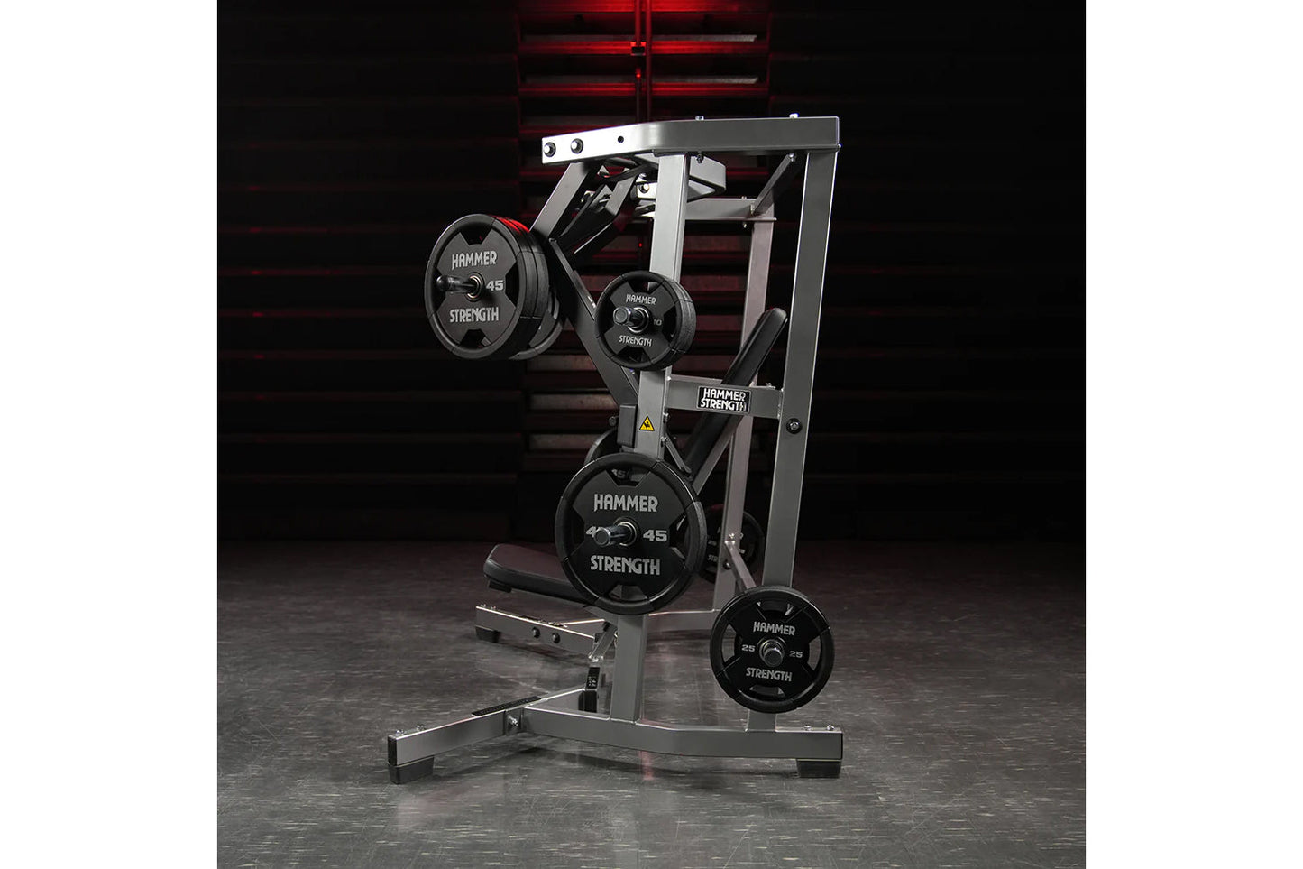 Hammer Strength plate-loaded iso-lateral wide chest machine with black weight plates on silver steel frame in gym setting