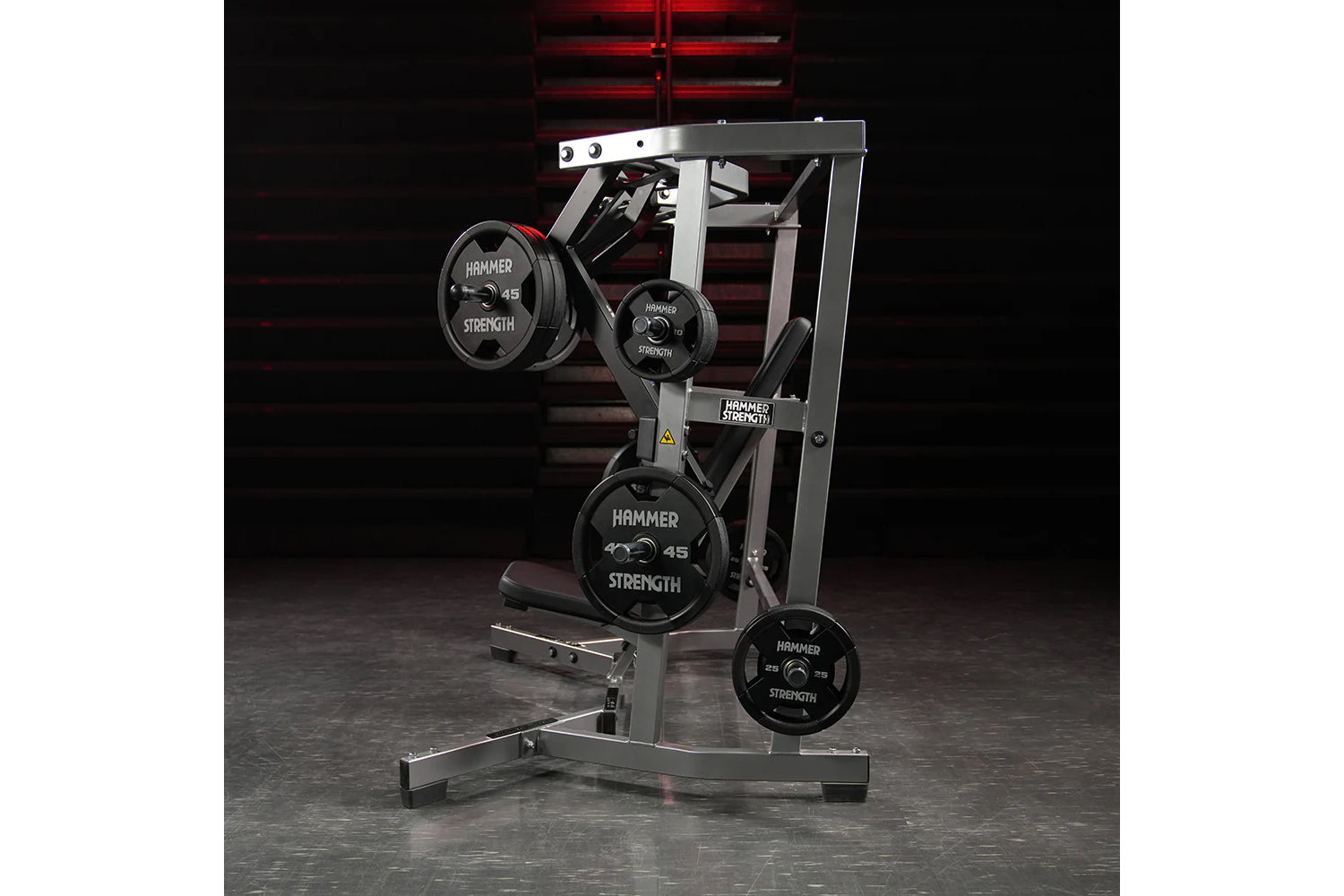 Hammer Strength plate-loaded iso-lateral wide chest machine with black weight plates on silver steel frame in gym setting
