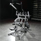Hammer Strength plate-loaded iso-lateral wide pulldown machine with dual handles, footplate, and weight plates loaded on gym 