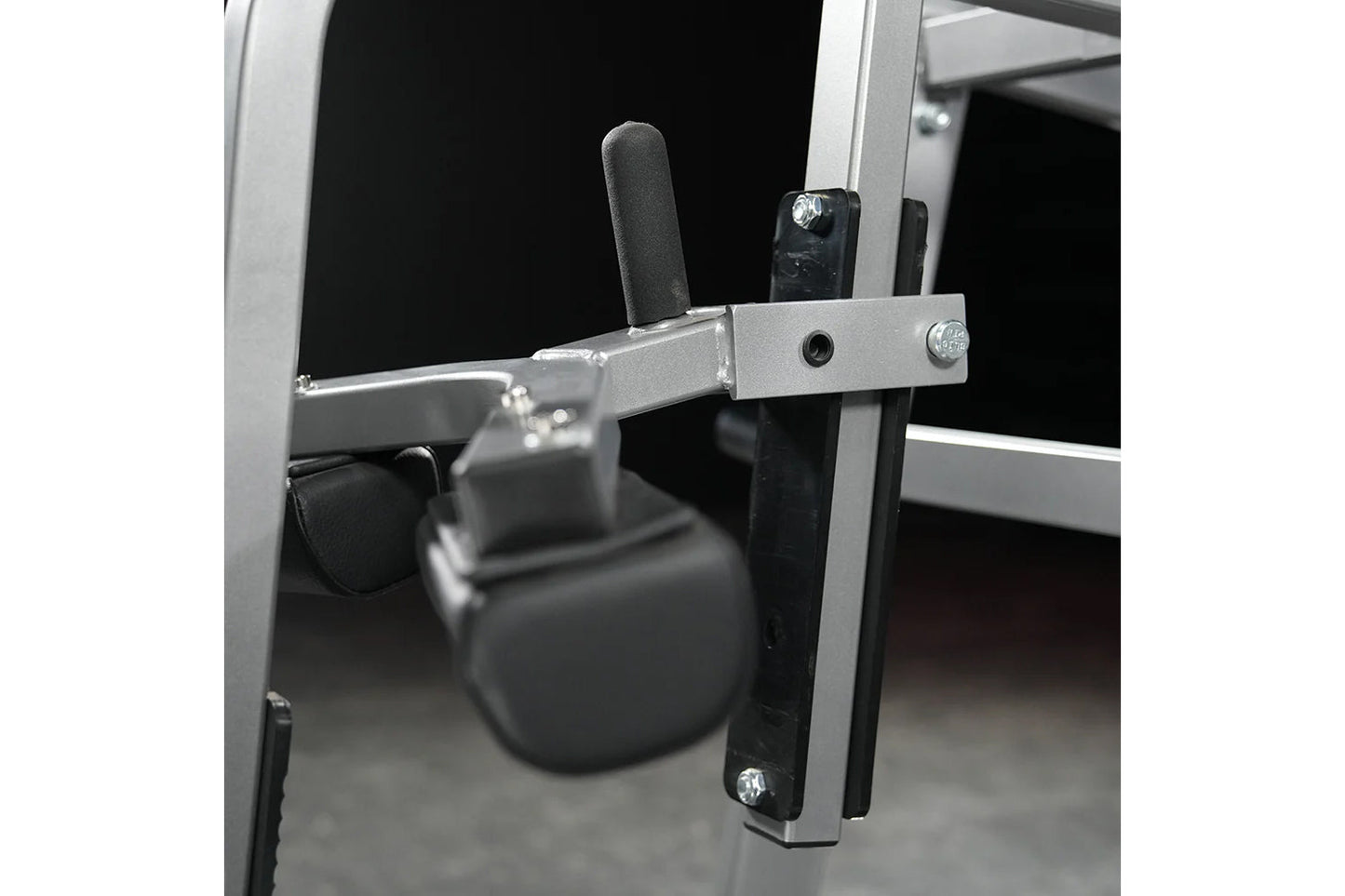 Hammer Strength plate-loaded iso-lateral wide pulldown machine with silver frame and black handles, detail view of adjustment