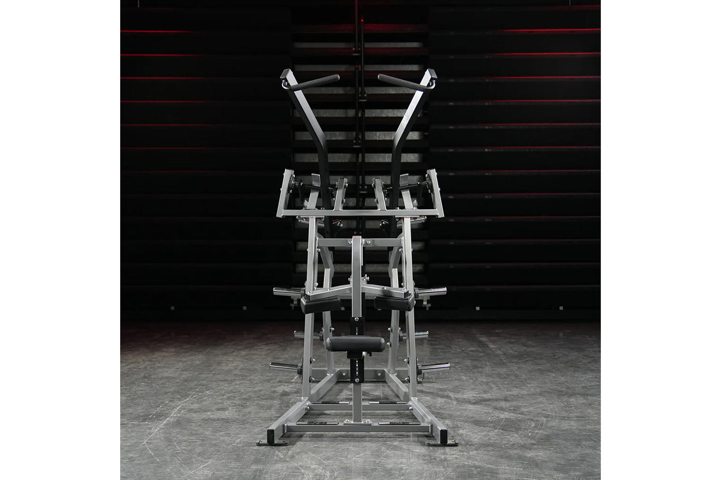 Hammer Strength plate-loaded iso-lateral wide pulldown machine with white frame and black handles in gym setting