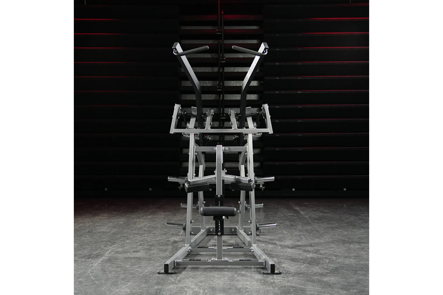 Hammer Strength plate-loaded iso-lateral wide pulldown machine with white frame and black handles in gym setting