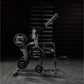Hammer Strength black plate-loaded iso-lateral wide pulldown machine with labeled weight plates, on concrete floor