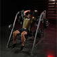Man using Hammer Strength plate-loaded pullover machine with arms extended, wearing olive shirt and black shorts in gym setti