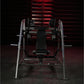 Hammer Strength plate-loaded pullover machine with black seat and dual chrome weight arms in gym setting