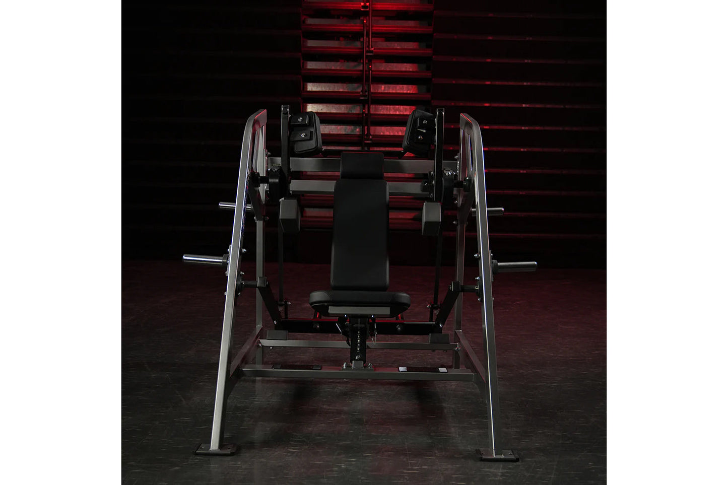 Hammer Strength plate-loaded pullover machine with black seat and dual chrome weight arms in gym setting