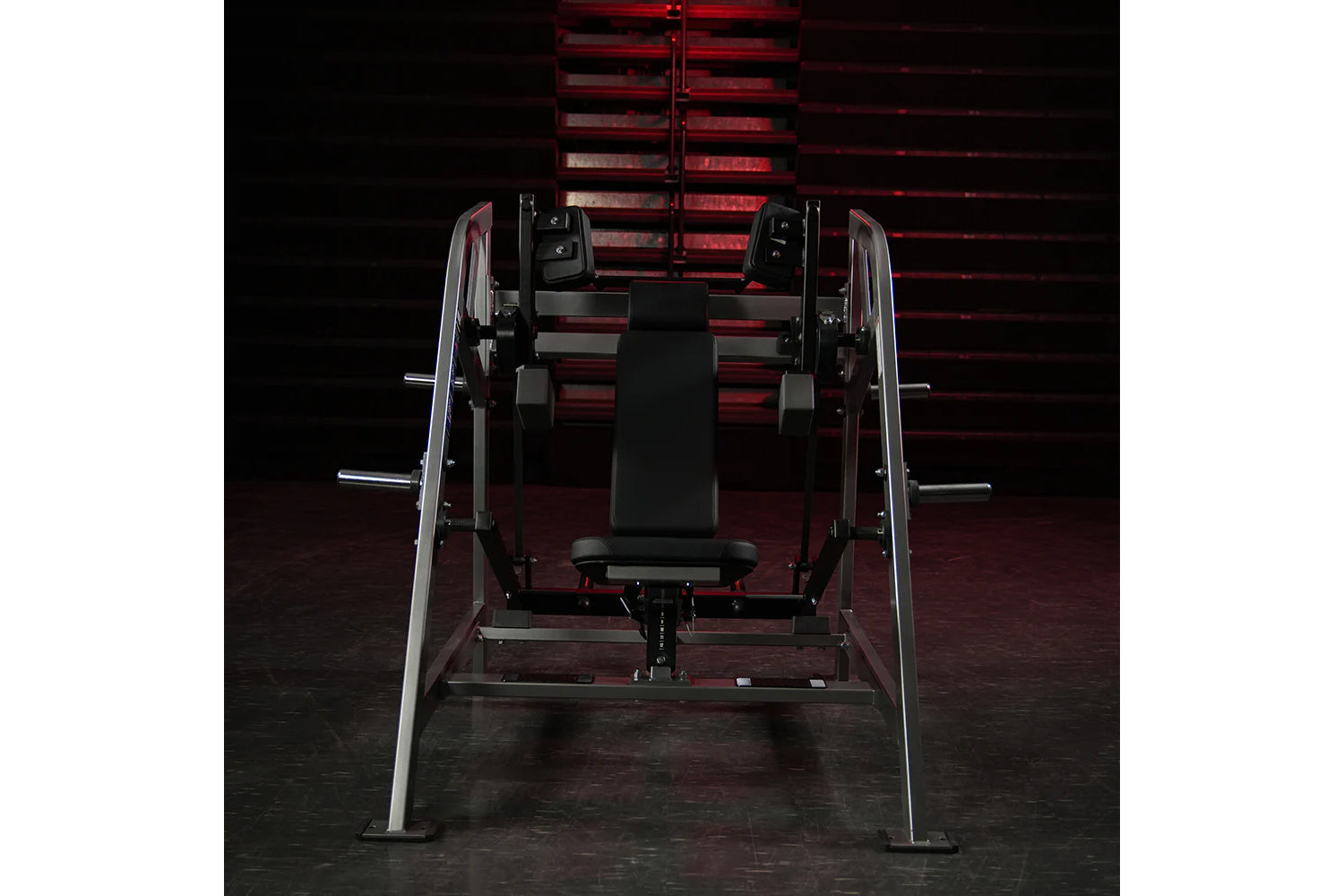 Hammer Strength plate-loaded pullover machine with black seat and dual chrome weight arms in gym setting