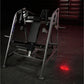 Hammer Strength plate-loaded pullover machine with black padded seat, silver frame, and digital controls on dark gym floor