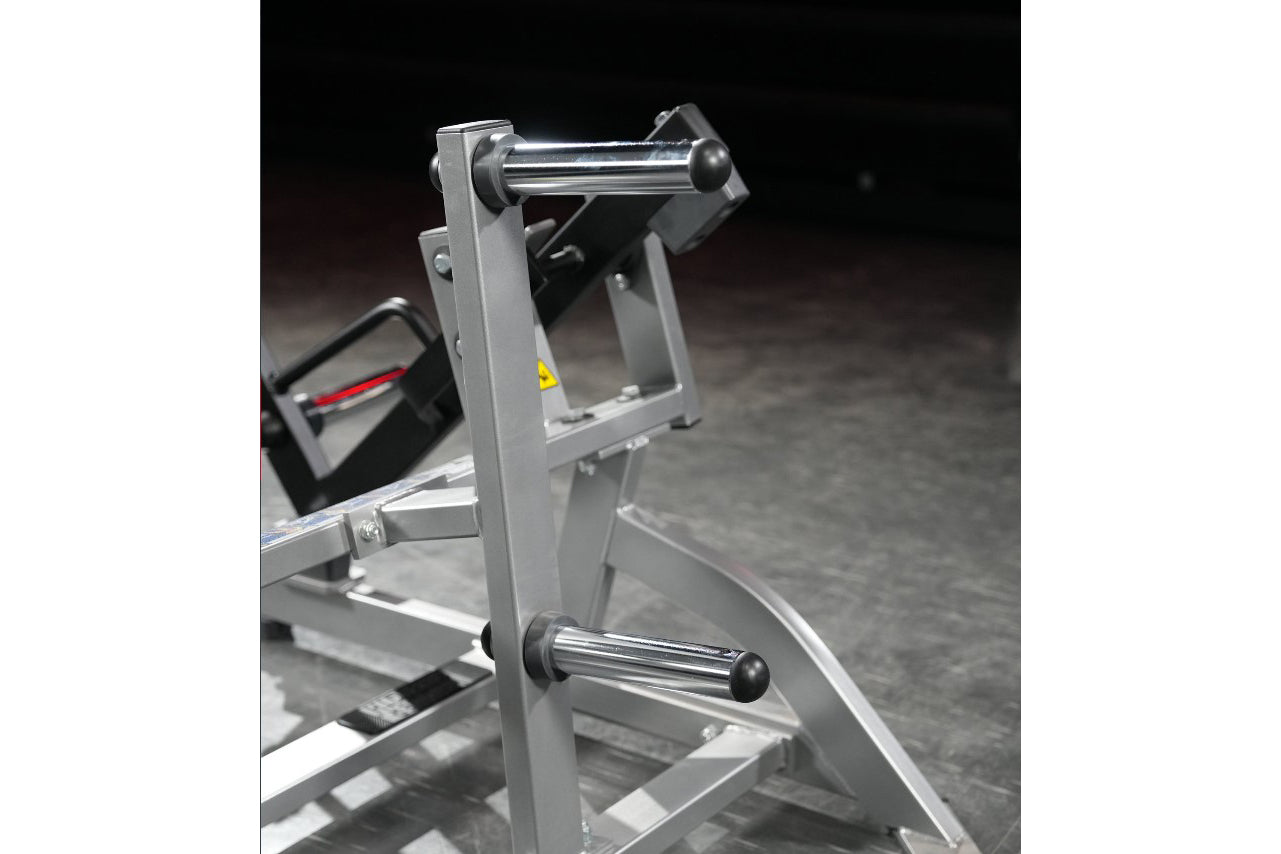 Hammer Strength plate-loaded squat high pull machine with gray frame and black handles on concrete floor