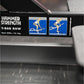 Hammer Strength T-bar row machine label with white text and instructional icons showing exercise form on blue background