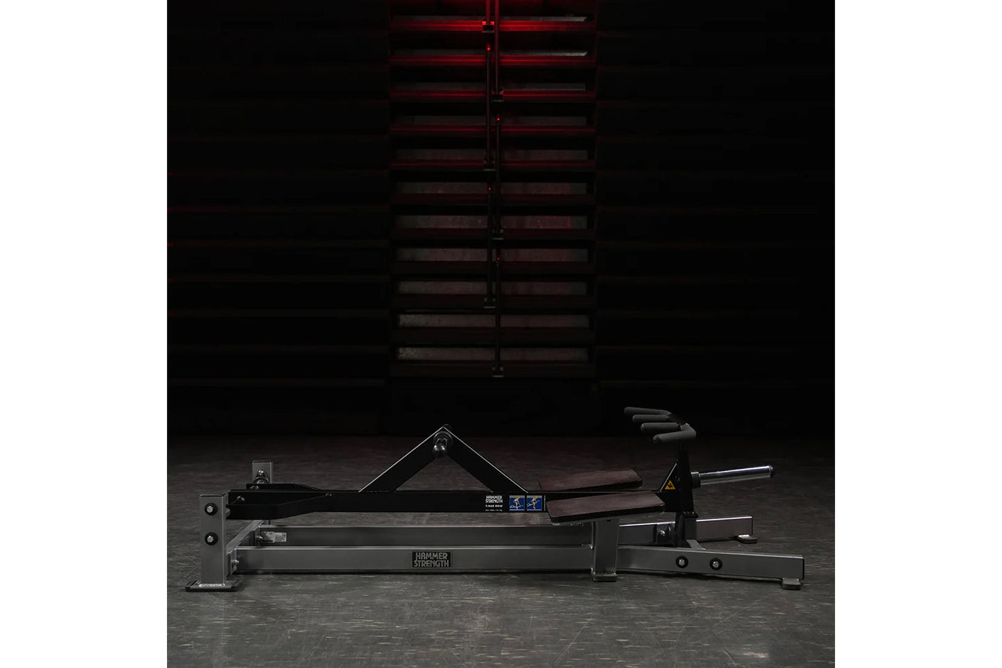 Hammer Strength plate-loaded T-bar row machine with black frame and angled chest pad, shown in gym setting