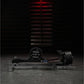 Hammer Strength plate-loaded T-bar row machine with black frame and weighted plates on concrete gym floor