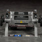 Hammer Strength plate-loaded tibia dorsi flexion machine with gray frame, black foot plates, and yellow caution symbol, front