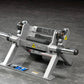 Hammer Strength plate-loaded tibia dorsi flexion bench machine with gray and black frame, metallic cylinders, and yellow warn