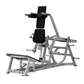 Hammer Strength plate-loaded V-squat machine with gray steel frame, black padded seat and backrest on white background