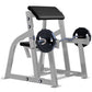 Hammer Strength seated arm curl machine with gray steel frame, black padded seat and backrest, black weight plates, and curve