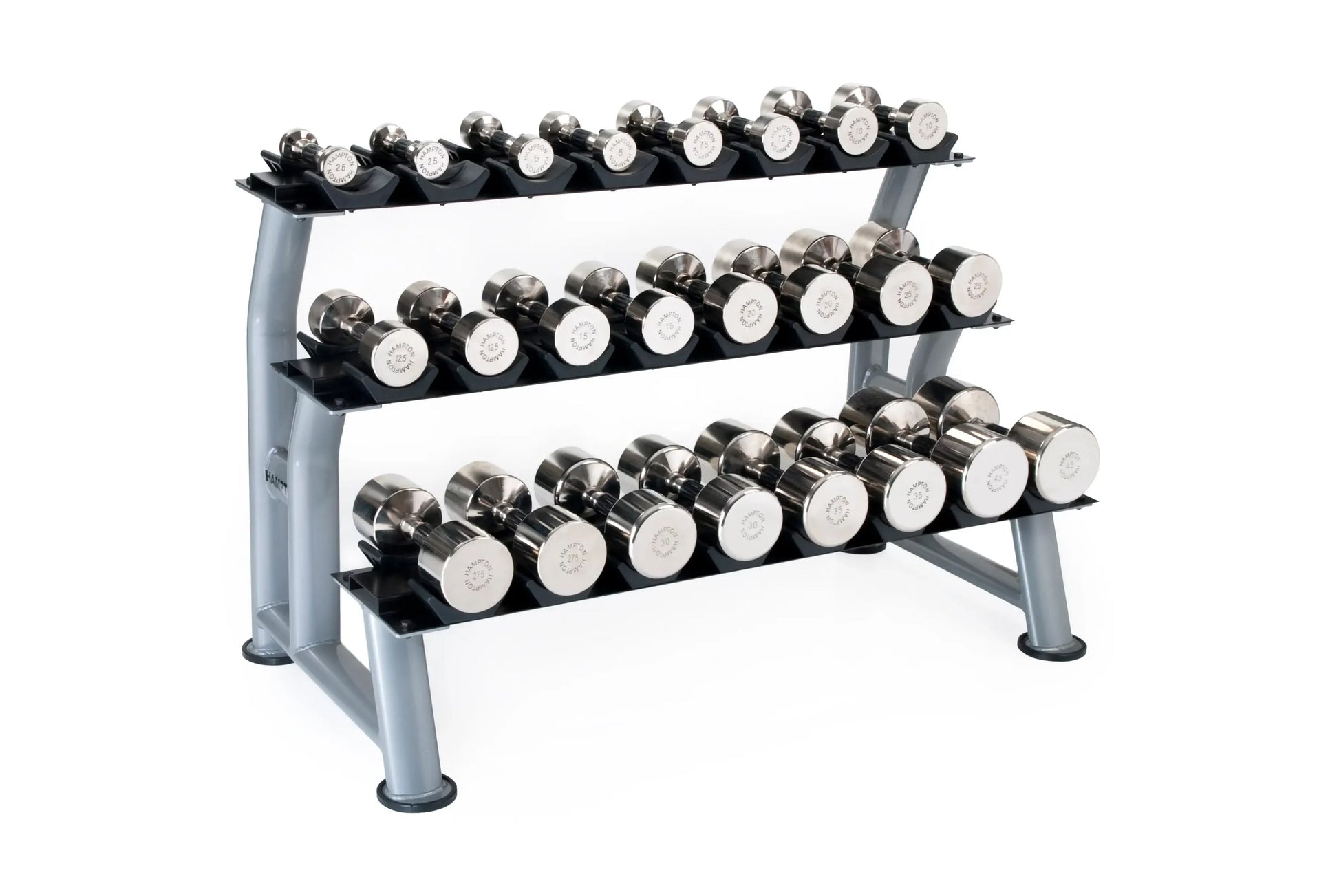 Three-tiered dumbbell rack with gray steel frame holding black dumbbells with chrome heads and white grip labels on white bac