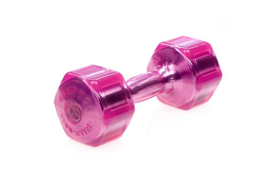 Bright pink transparent urethane dumbbell with hexagonal head and clear plastic handle, displayed on white background