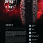 Harvia Spirit electric sauna heater with rounded stones and metal cage design against red atmospheric background