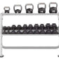 Two-tier dumbbell rack with chrome frame holding five kettlebells on top shelf and multiple black hexagon dumbbells on middle