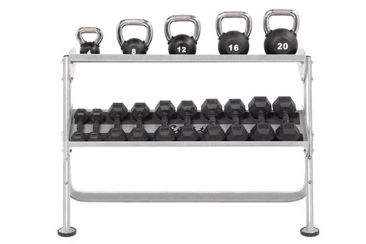 Two-tier dumbbell rack with chrome frame holding five kettlebells on top shelf and multiple black hexagon dumbbells on middle