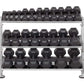 Four-tier chrome and gray dumbbell rack holding multiple pairs of black hexagonal dumbbells, displayed on white background