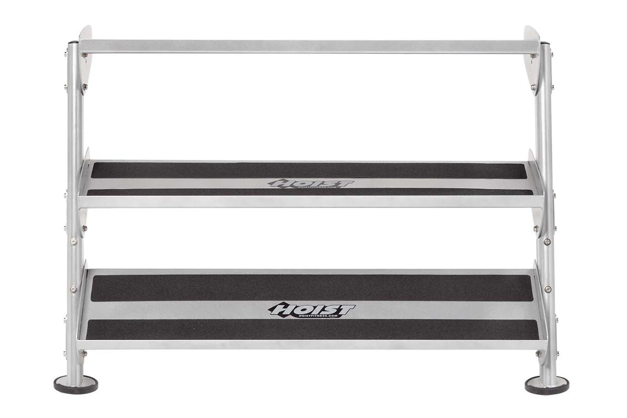 Hoist 48-inch three-tier dumbbell rack with silver aluminum frame, black grip steps, and anti-slip base pads