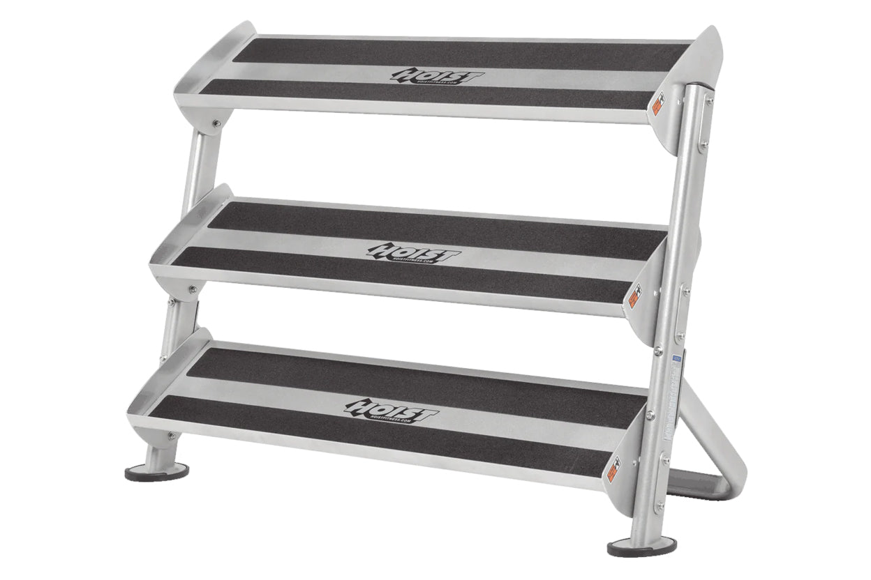 Hoist 48-inch 3-tier dumbbell rack with silver aluminum frame and black grip steps, on white background