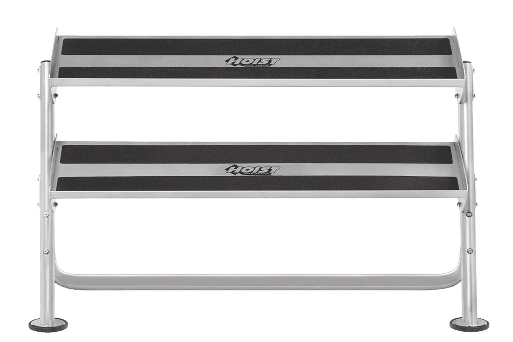 Hoist 60-inch 2-tier dumbbell rack with silver aluminum frame and black rubber-lined shelves, front view on white background