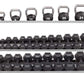Silver metal dumbbell rack with three tiers holding black hexagonal dumbbells and kettlebells ranging from 4 to 24 pounds, on
