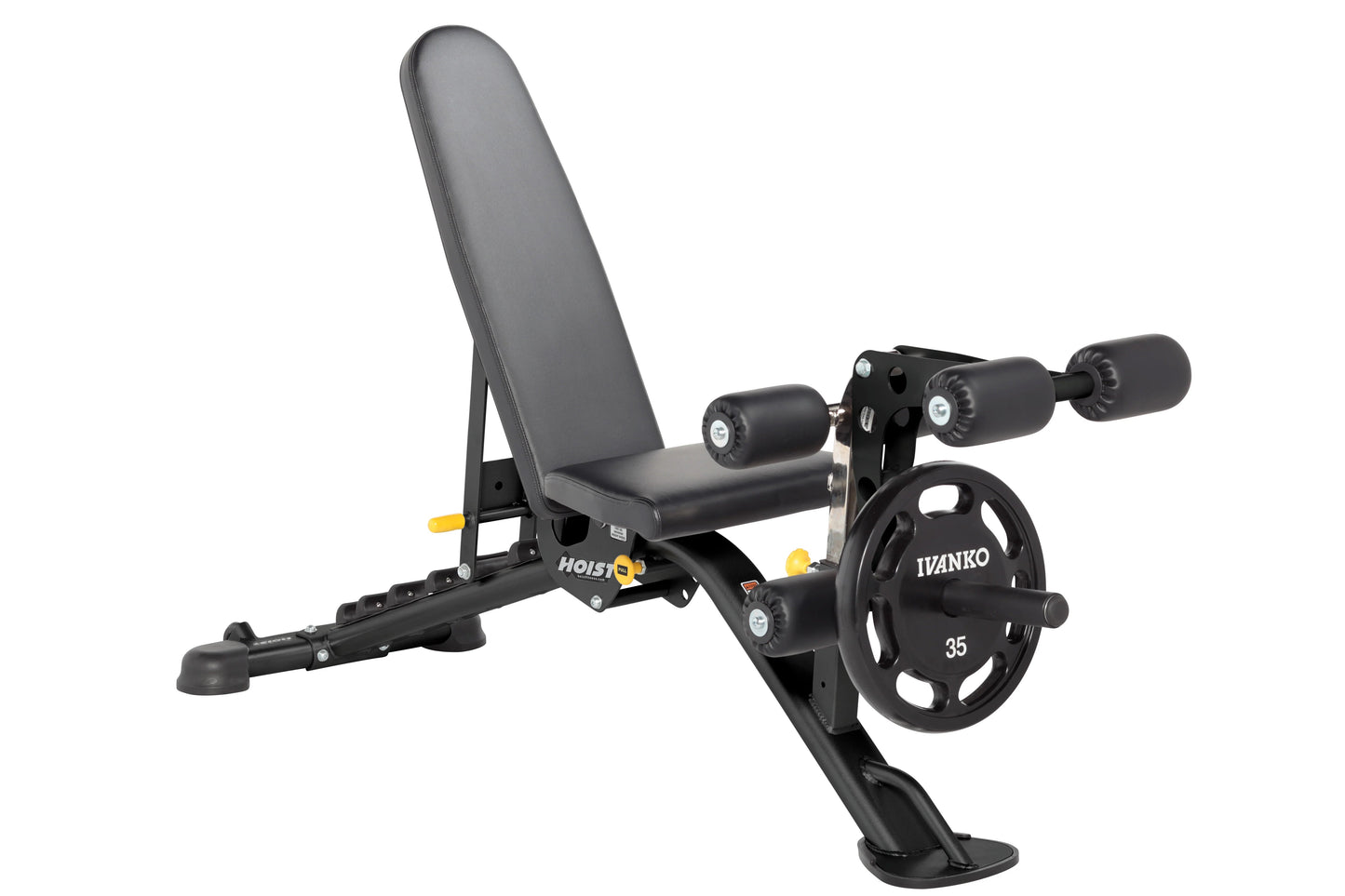 Black and yellow Hoist 7-position FID weight bench with adjustable backrest, leg extension attachment, and weight plate stora