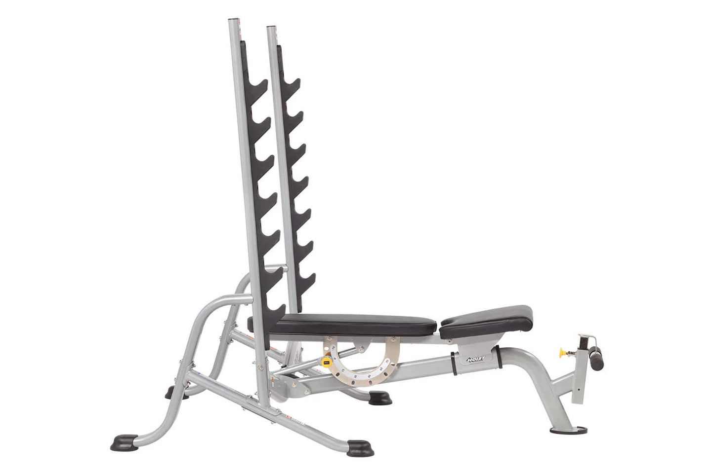 Silver and black multi-position weight bench with dual barbell racks, adjustable backrest, and leg extension attachment on wh