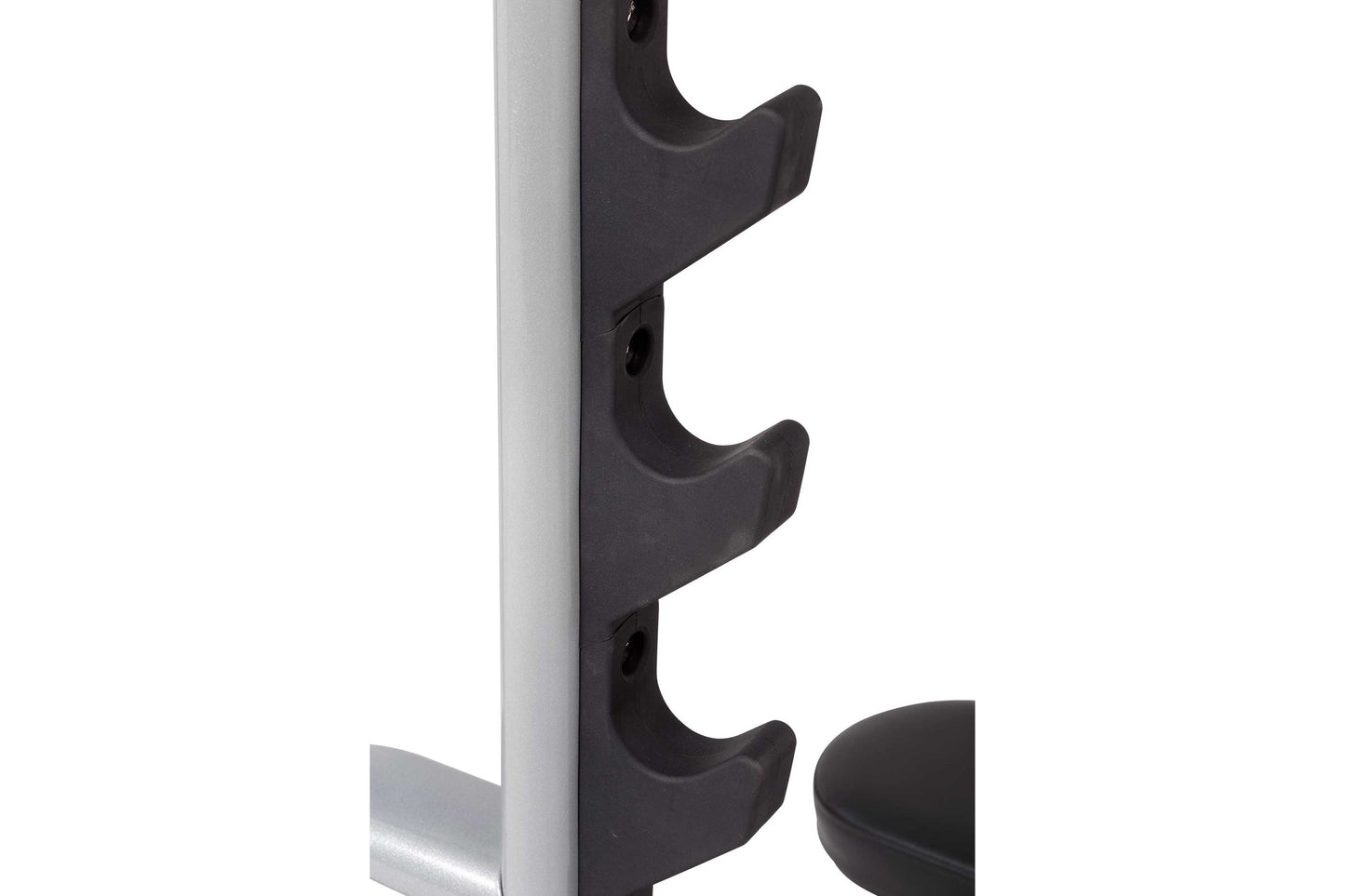 Black polymer barbell holder arms mounted on silver metal uprights of weight bench rack