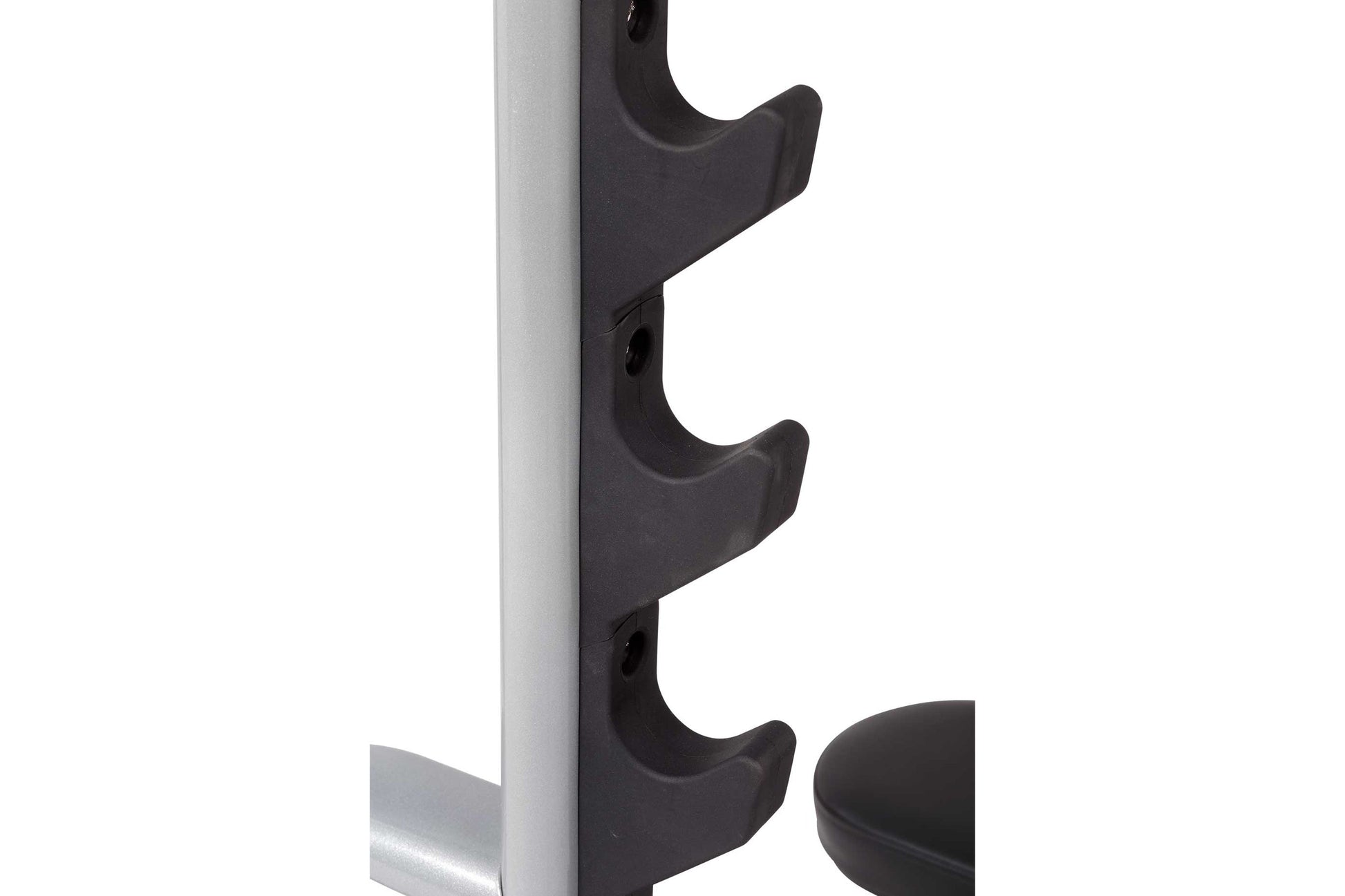 Black polymer barbell holder arms mounted on silver metal uprights of weight bench rack