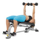 Person in blue shirt performing dumbbell chest press on Hoist silver and black weight bench with adjustable backrest