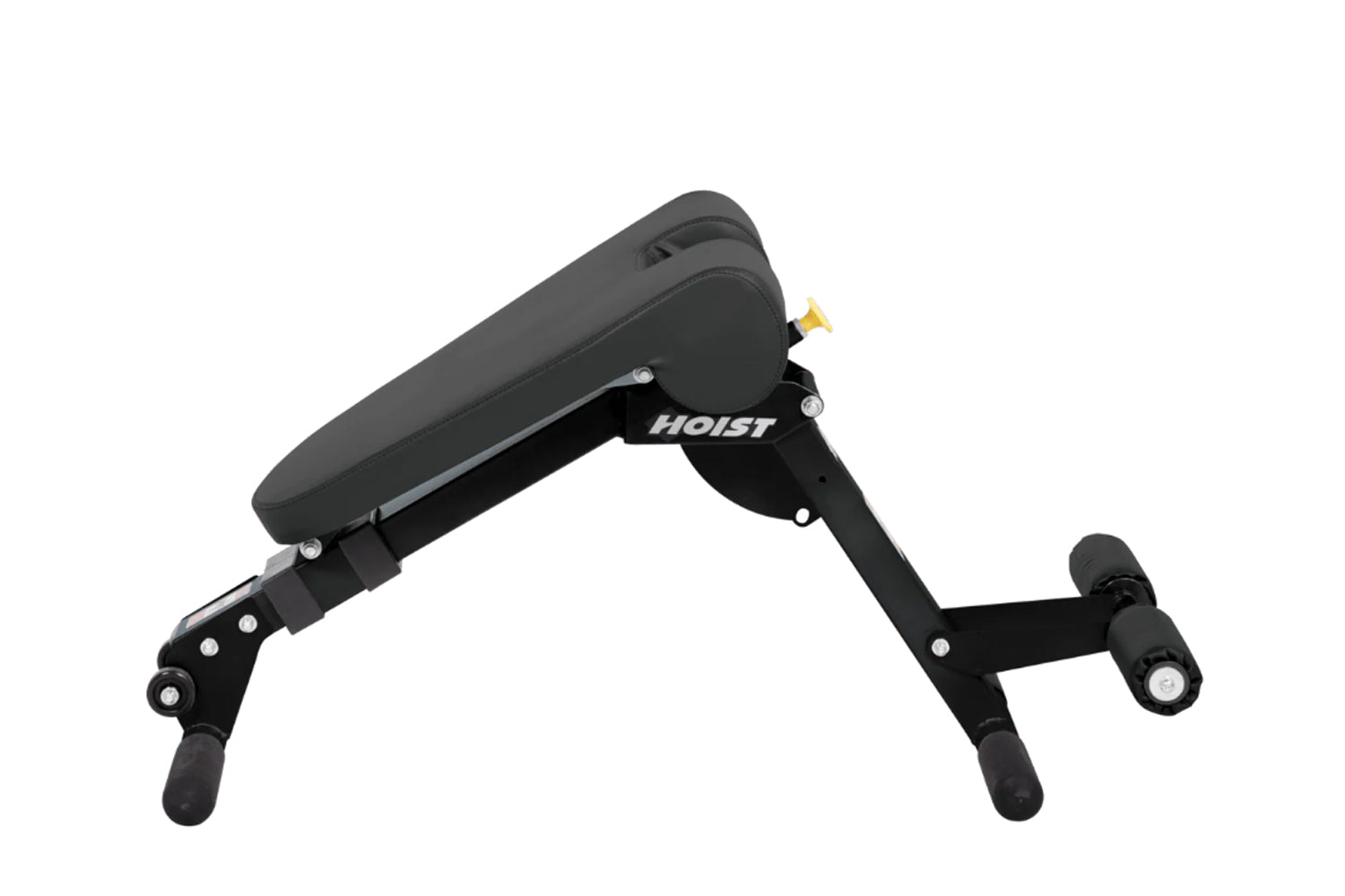 Black Hoist ab/back hyper bench with padded backrest, adjustable leg platform, and yellow safety pin on white background