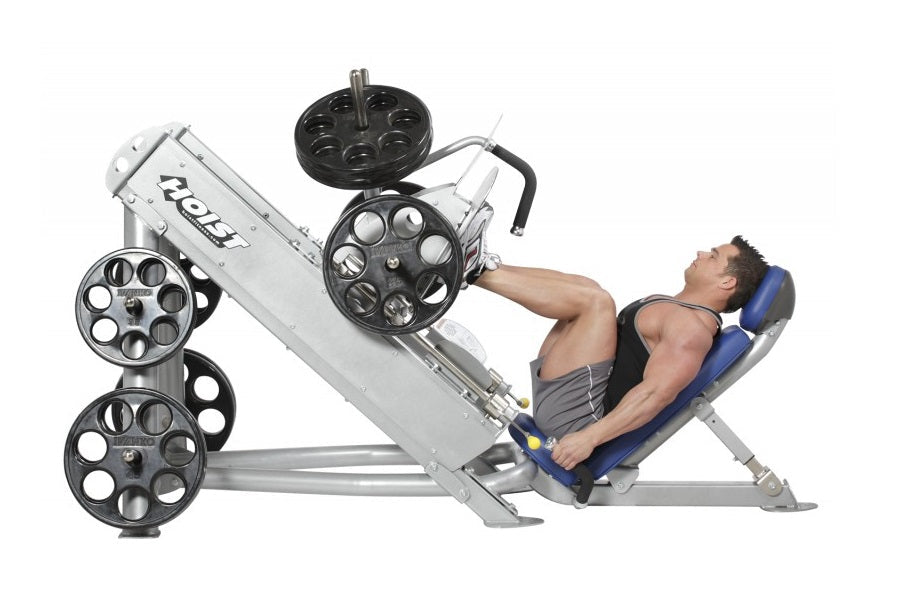 Hoist Angled Linear Leg Press machine with weight plates, model CF-3355, demonstrated by shirtless male user on white backgro