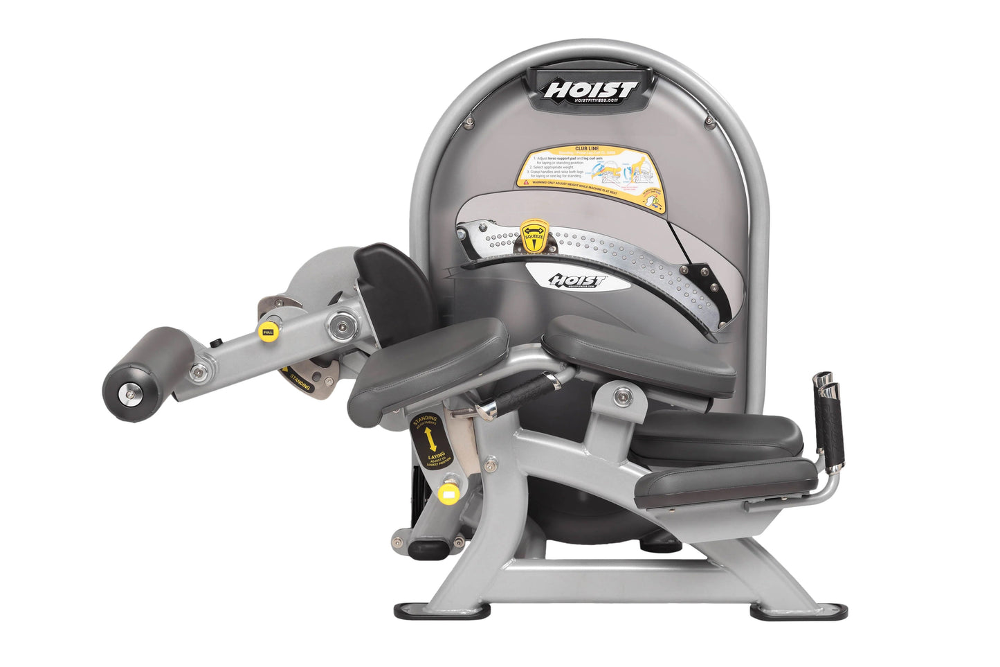 Hoist Standing/Prone Leg Curl machine with gray frame, black padded seat and leg extension, yellow accents, on white backgrou