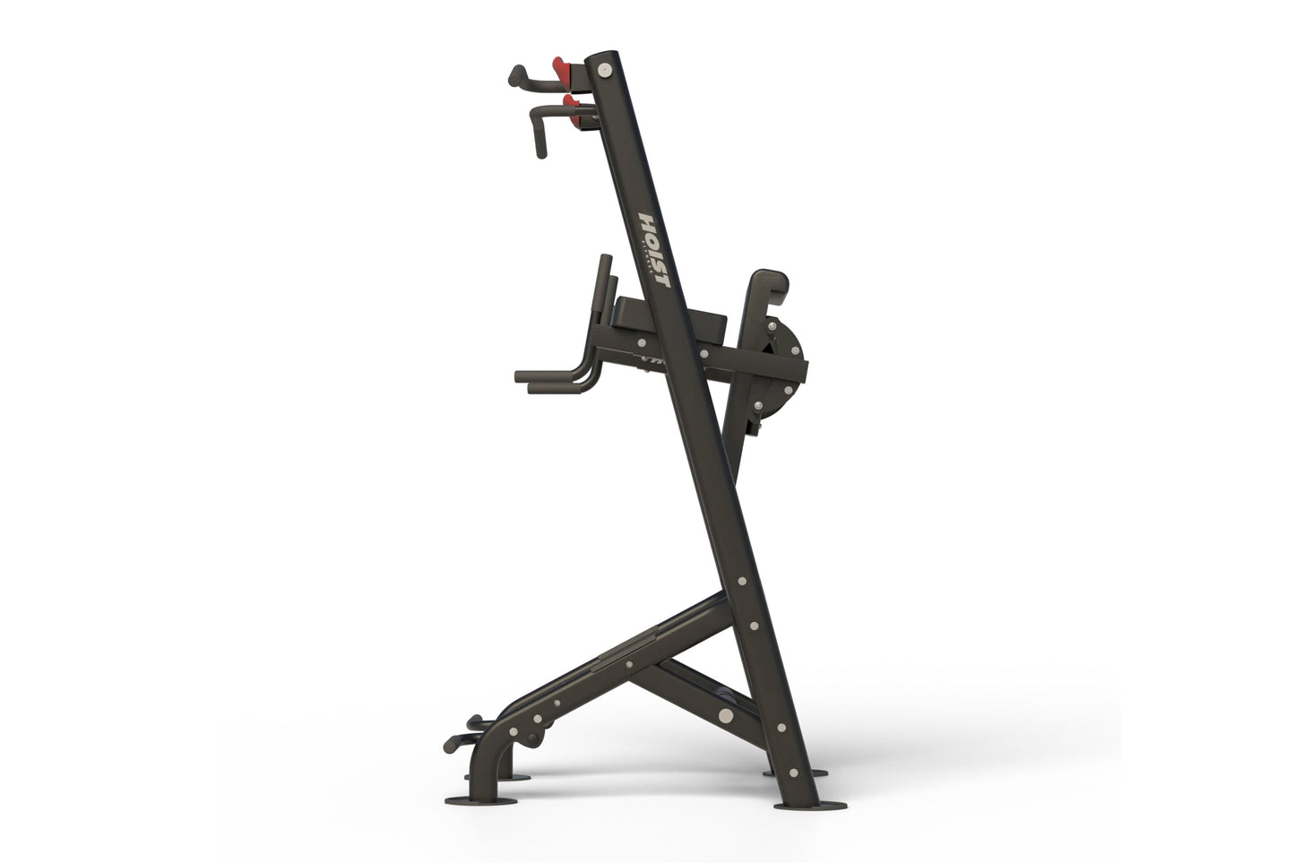 Black upright exercise machine with foot pedals and hand grips on white background