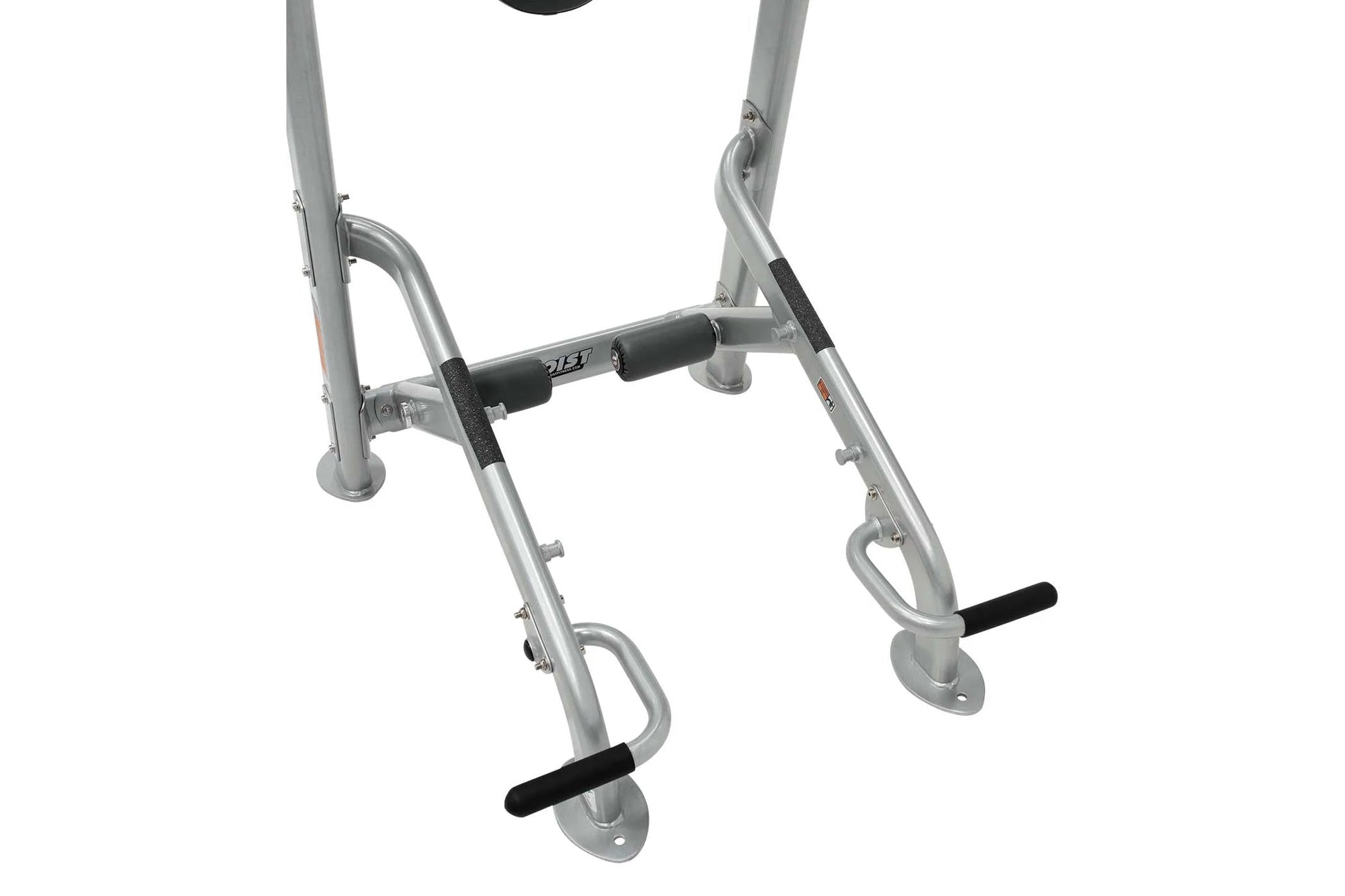 Silver metal home gym machine with black foam handlebars and foot pedals, flat lay on white background